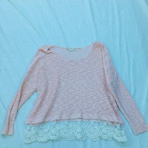 Light pink sweater.